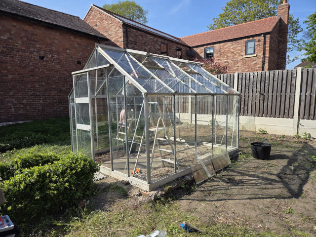 Greenhouse glass replacement and cleaning